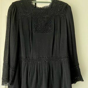 Lace blouse with detailing at neck and waist